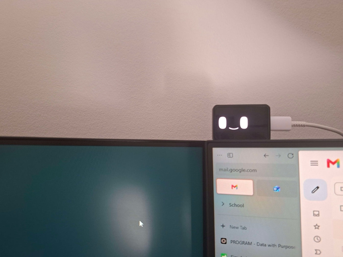 “Bimo looks like such a Tiny Little Guy TM watching me work over my 2 monitors”